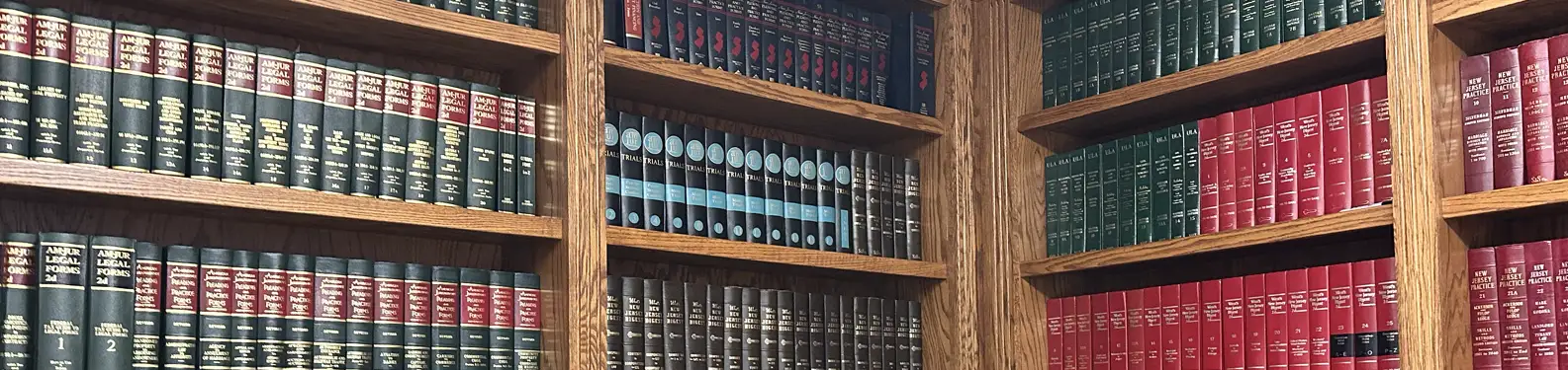 Bookshelves filled with law books at the Law Offices of Nolan & Lange.