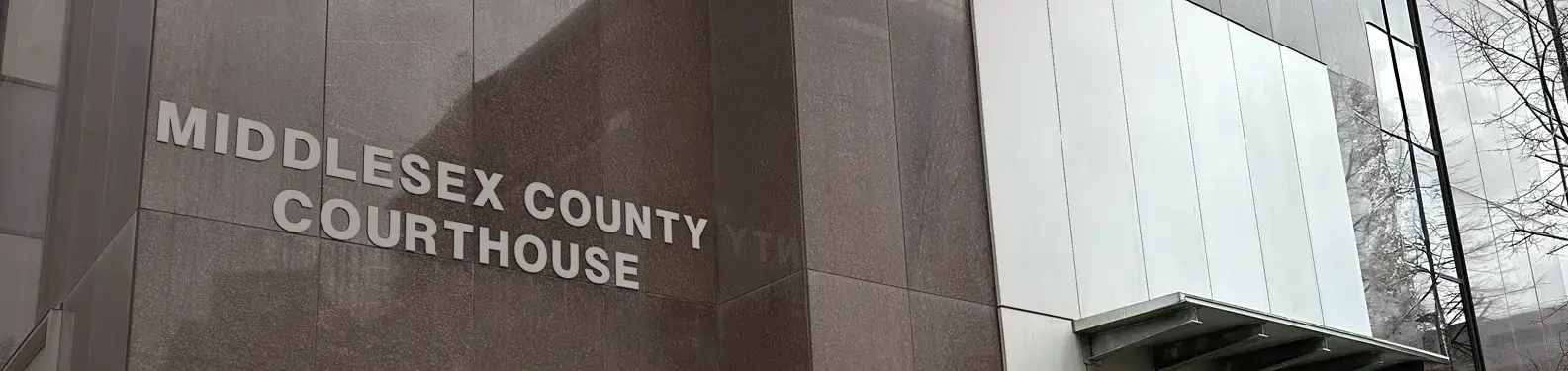Close-up of the Middlesex County Courthouse lettering on the exterior building.